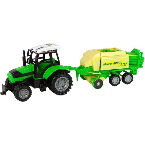 Zeleni traktor s prešom za baliranje slika 2