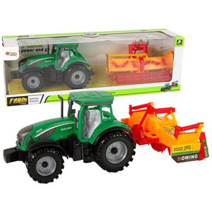 Zeleni traktor s narančastim kultivatorom