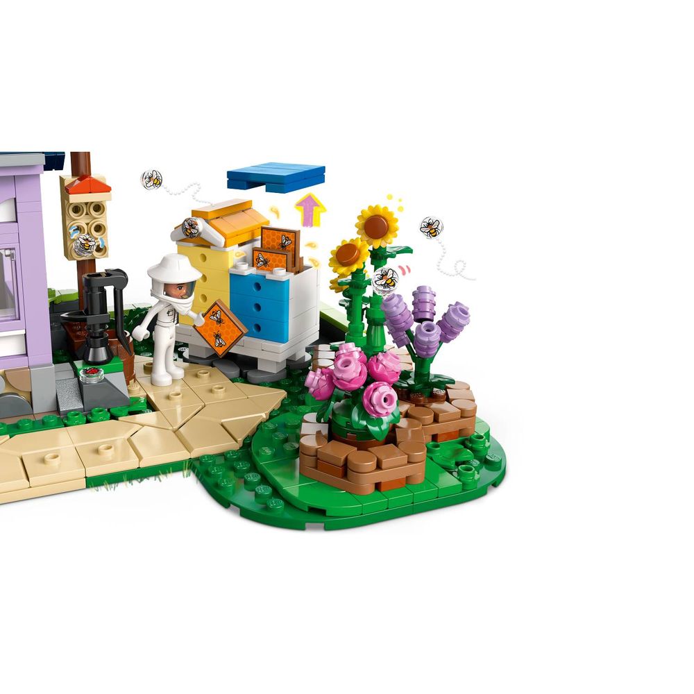 LEGO 42669 Pčelarska kuća i vrt pun cvijeća slika 7