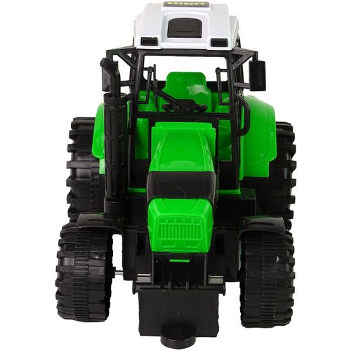 Zeleni traktor s prešom za baliranje slika 6