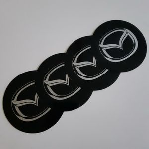 AMBLEMI ZA RATKAPE MAZDA FI76mm (SET 4 KOMADA)