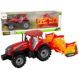 Crveni traktor s narančastim kultivatorom