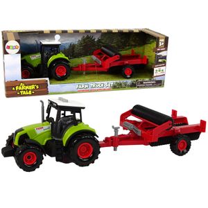 Traktor sa crvenom prikolicom frezom