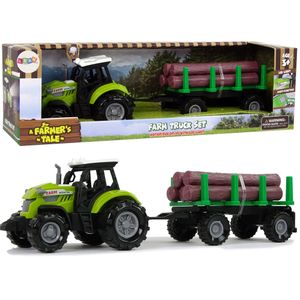 Zeleni traktor s prikolicom i balvanima