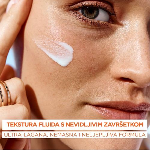 Garnier Ambre Solaire dnevni fluid protiv tamnih mrlja s vitaminom C SPF 50+ slika 6