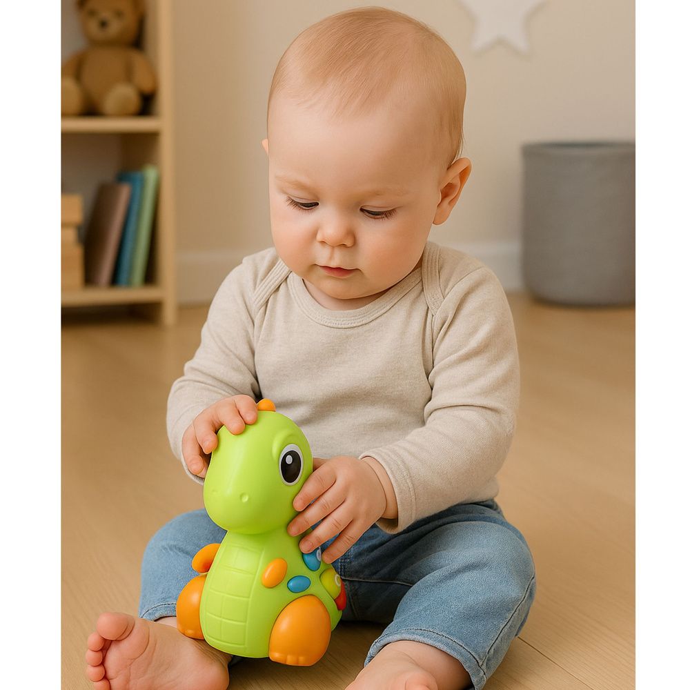 Interaktivna igračka za malu djecu Dinosaur na kotačima sa svjetlima i zvukovima slika 3