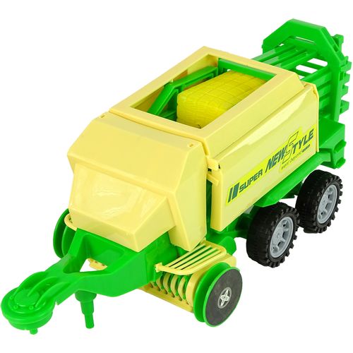 Zeleni traktor s prešom za baliranje slika 7
