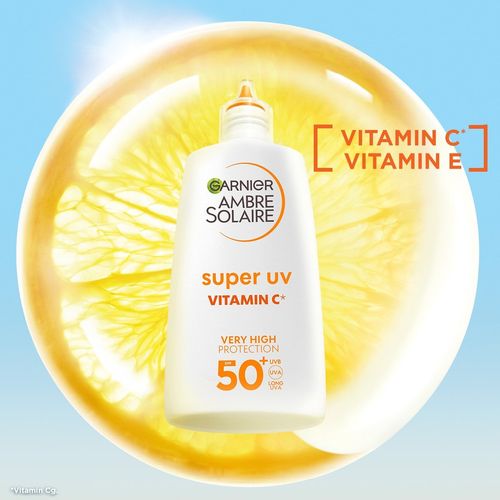 Garnier Ambre Solaire dnevni fluid protiv tamnih mrlja s vitaminom C SPF 50+ slika 2