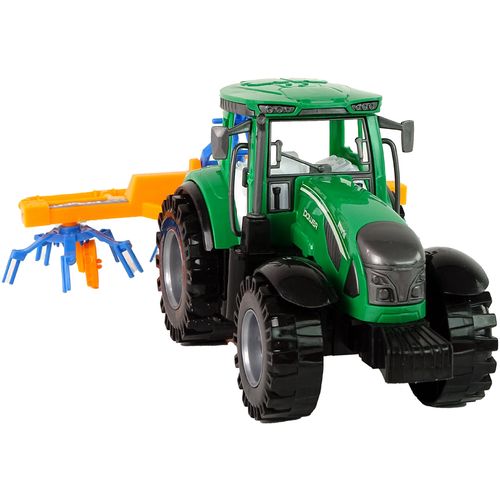 Zeleni traktor s narančastim grabljama slika 6