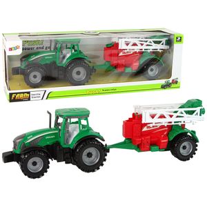 Zeleni traktor sa crvenom prskalicom